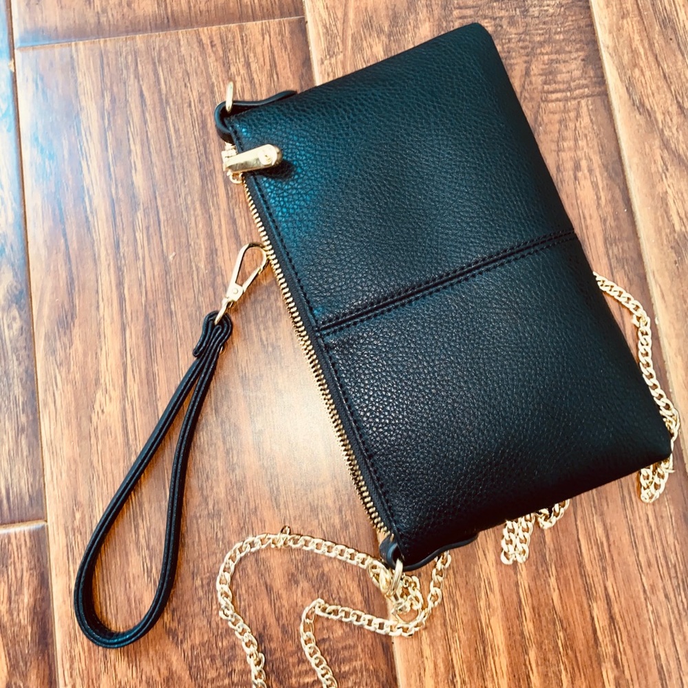 Faux leather black purse with gold chain!